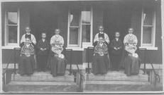 SA0152 - Photograph of members of the Church Family, four women and one boy on the porch of a building. There is an ad on the back for other views., Winterthur Shaker Photograph and Post Card Collection 1851 to 1921c